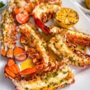Grilled Lobster Tails on a white platter
