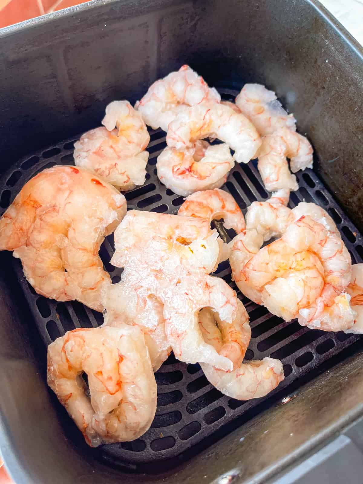 Frozen shrimp in air fryer basket