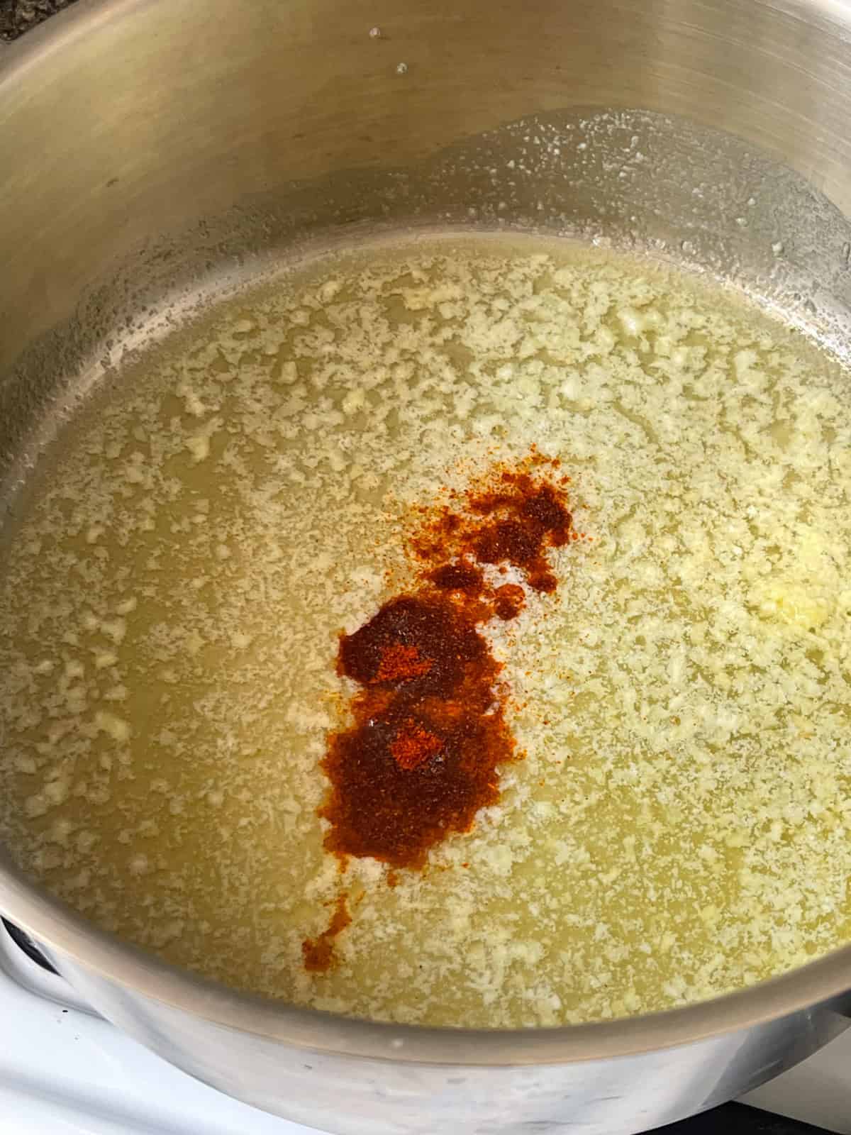 paprika, garlic and butter in bowl.
