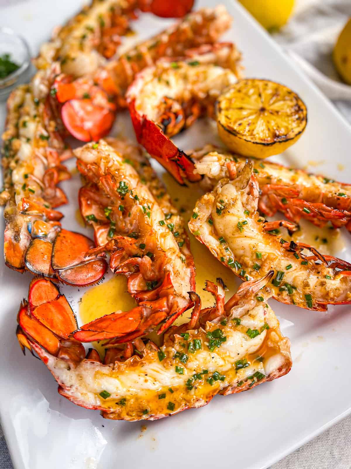 Lobster tails served on a platter.