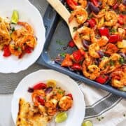 Harissa shrimp on a sheet pans and two bowl