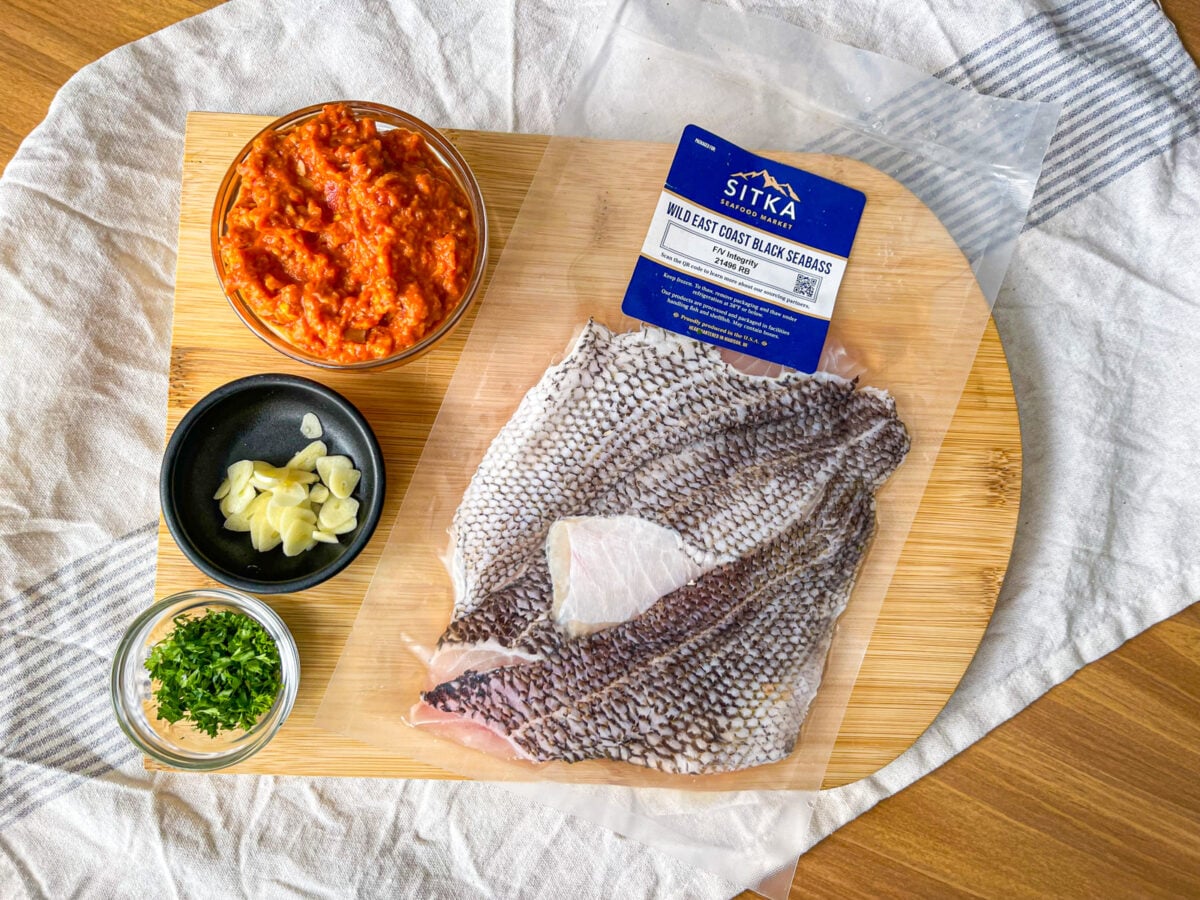 Ingredients for crispy black bass on table.