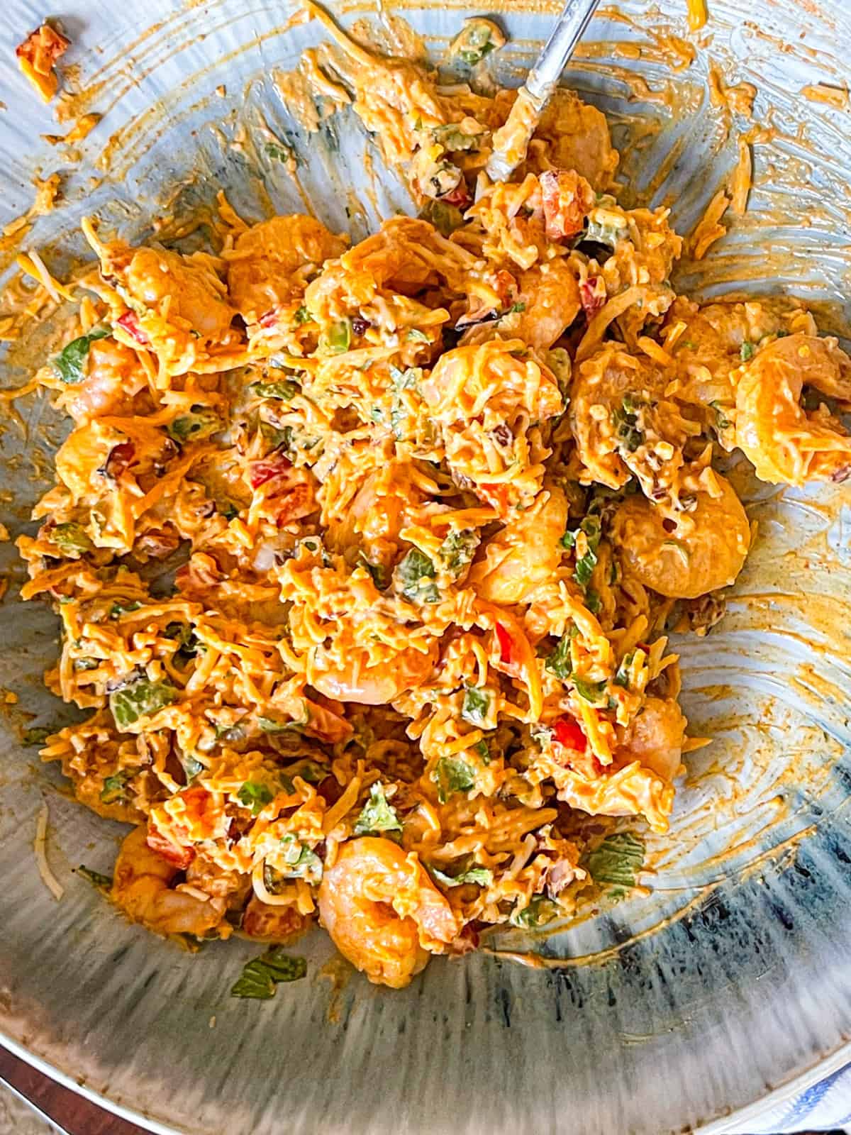 Shrimp chimi mixing in sauce