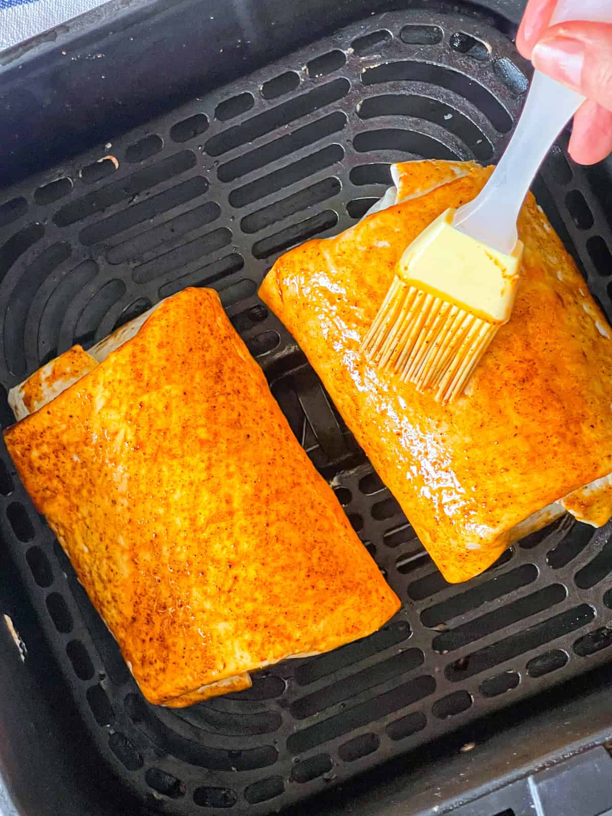 spiced oil brushed on chimichanga