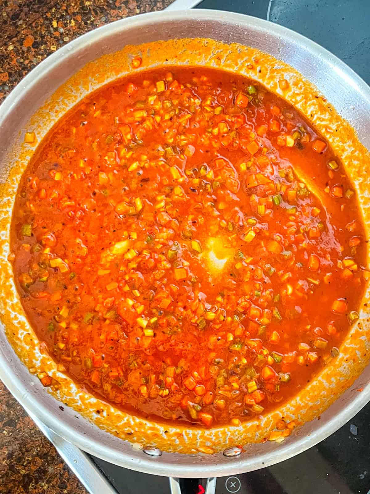 white wine added to ragu sauce.