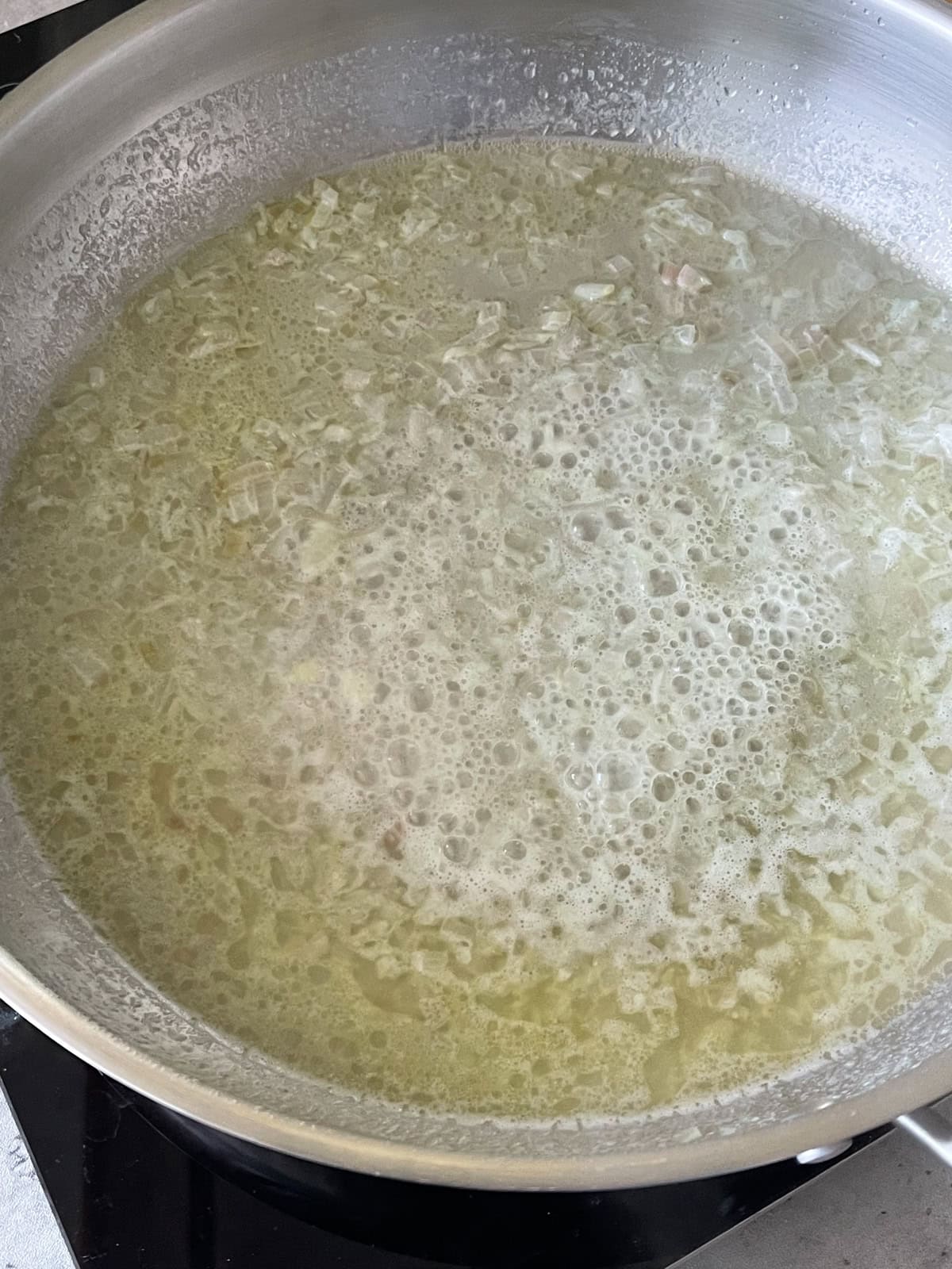 wine simmering in skillet.
